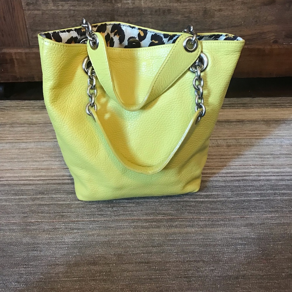 Chartreuse leather bucket bag. H 9.5”, W 11” at top 10” at lower part. Bottom 3”